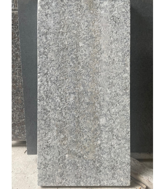 Đá  Granite màu Trắng Suối Lau khò lửa